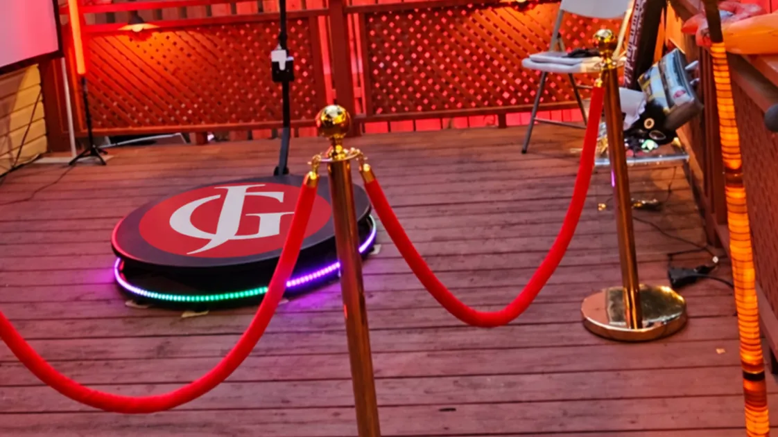 360 video booth platform with a ring light and red carpet at a Toronto event