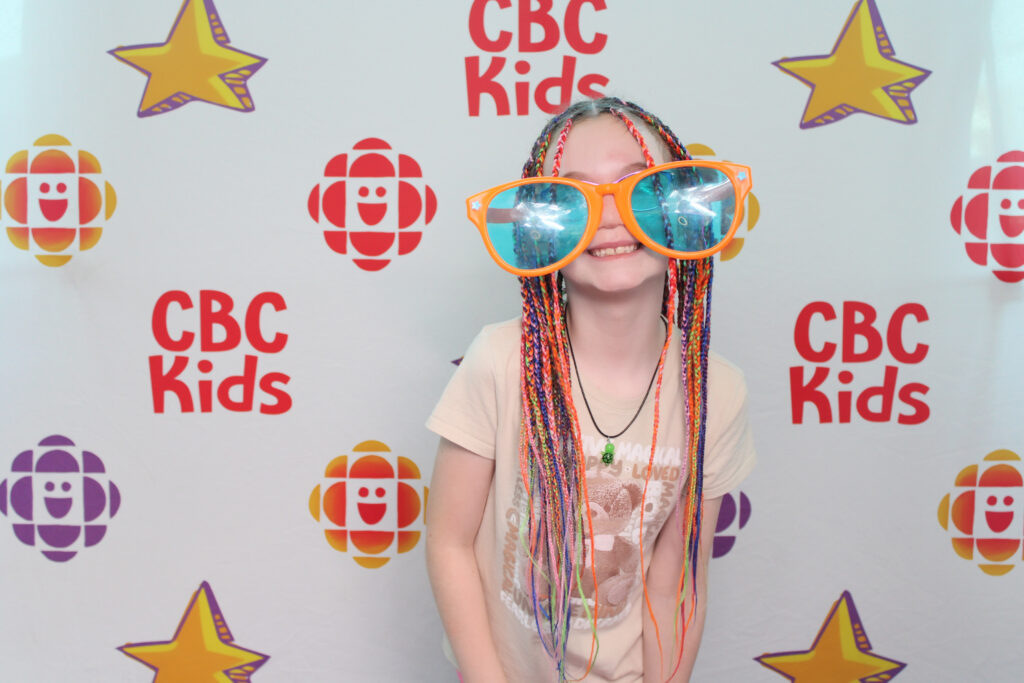 Child at a branded photo booth at a GTA brand activation