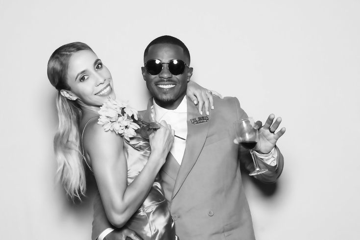 Wedding guests posing in a black and white Glam Booth photo in Toronto