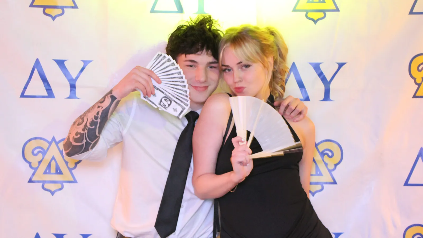 Guests at a formal photo booth in Oakville