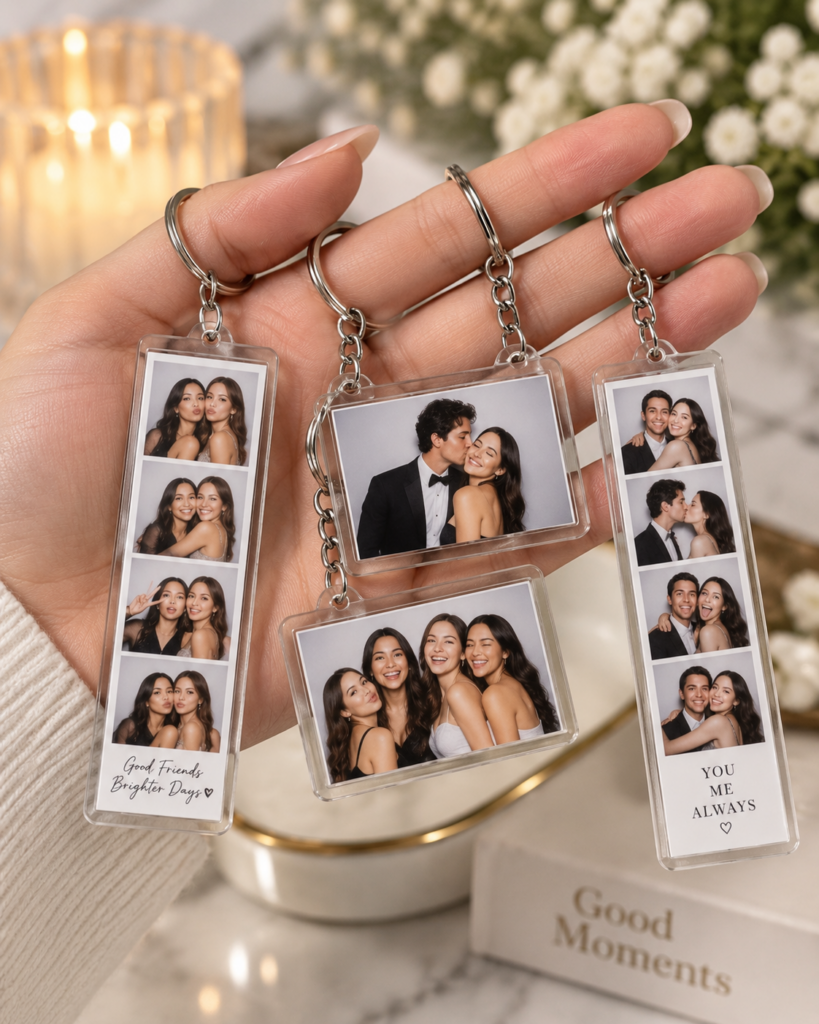 Guest holding photo keychain favours at a Toronto event
