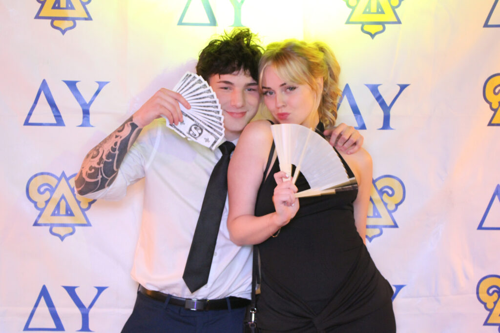 Guests at a formal photo booth