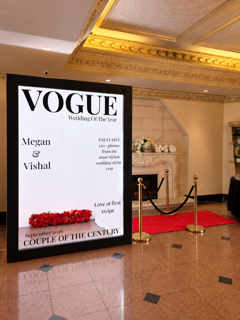 Magazine cover photo booth set up with a red carpet at a Toronto wedding venue